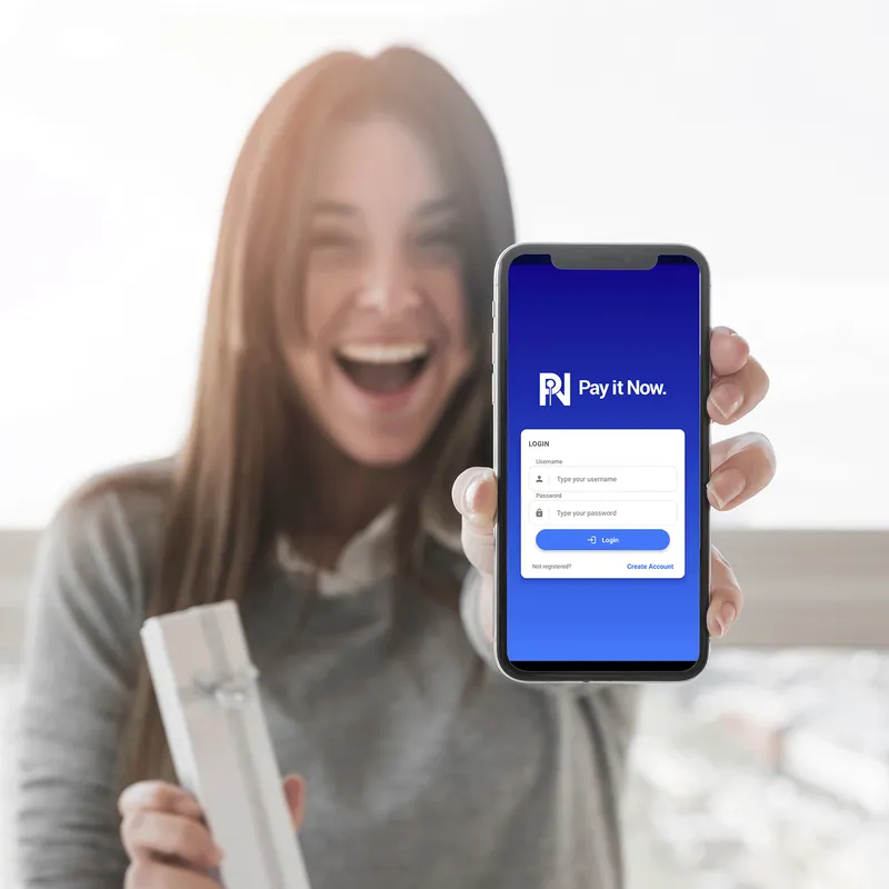 Woman excitedly showing off the PIN Network app on her smartphone